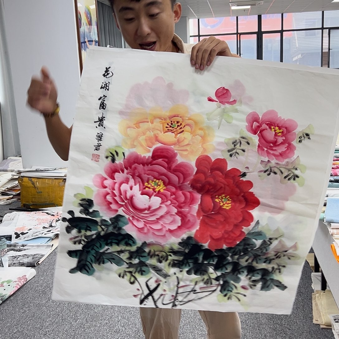 国画卖字画的小男孩