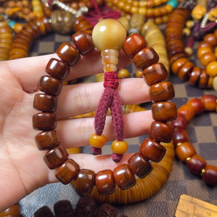 藏区牛牛材质手持