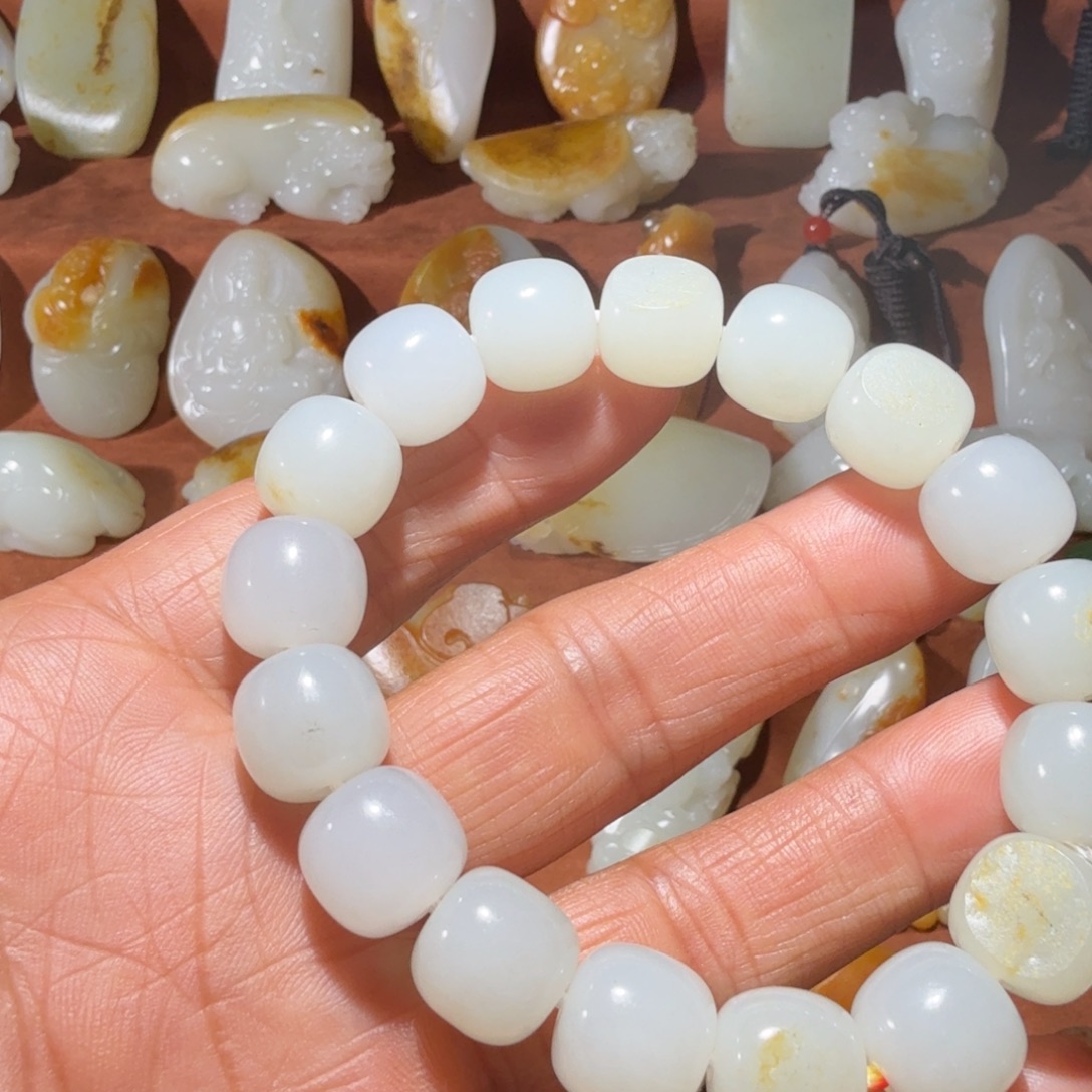 额***拉和田玉未镶嵌手链