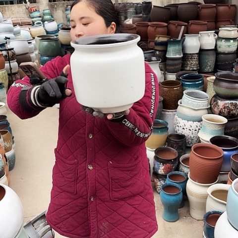 口21高22瑕疵盆子。