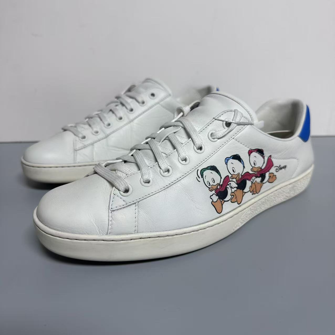 90新 GUCCI/古驰 联名 唐老鸭 ACE 白色 低帮男士板鞋 42码 lb231