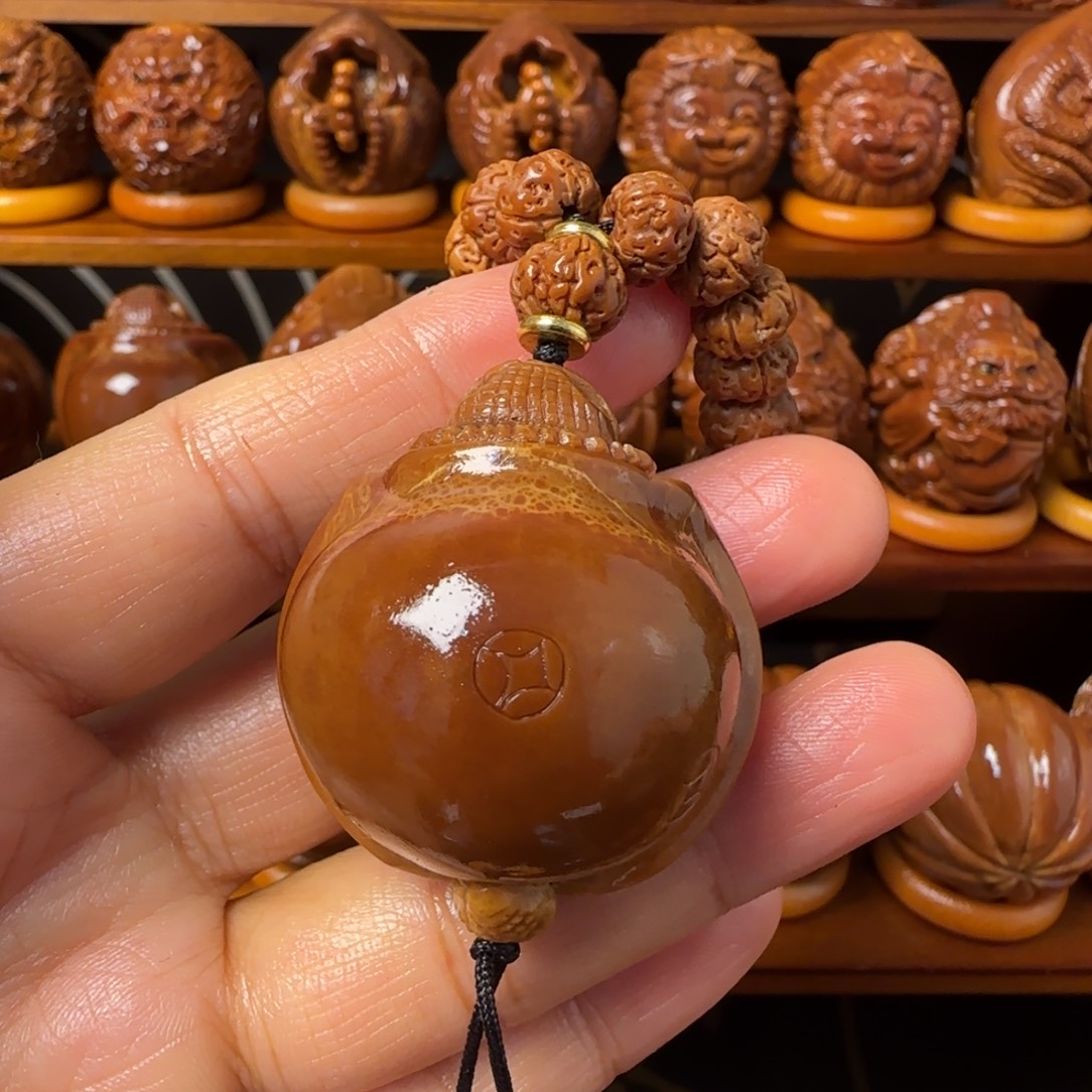 米***果把件橄榄核金钱龟手把件