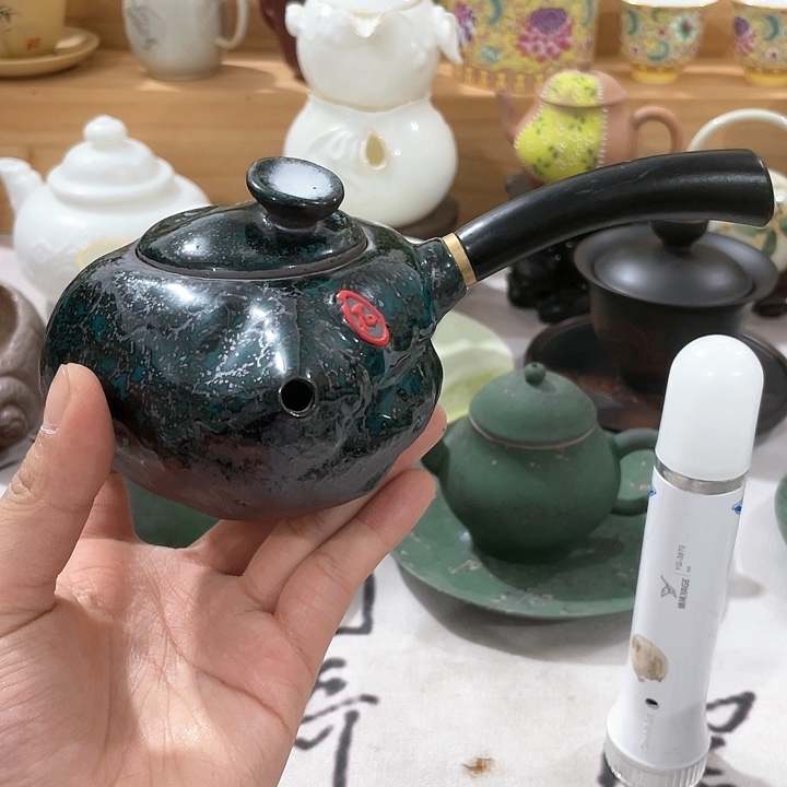 紫砂公道杯微瑕侧把