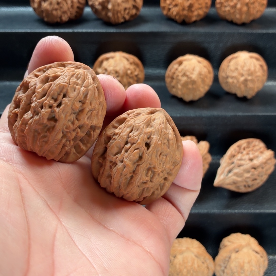 n***9桃核把件野生原树吸金兽38