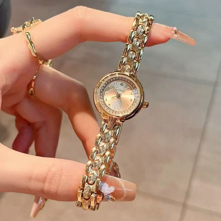 【涵涵】新款时尚小众轻奢潮流百搭精致小巧金色复古女士腕表  635