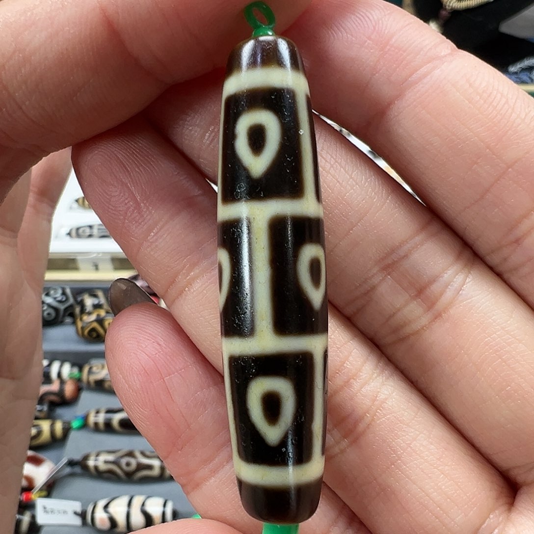 玛瑙/玉髓未镶嵌珠宝半成品建成牙黄佛心九眼