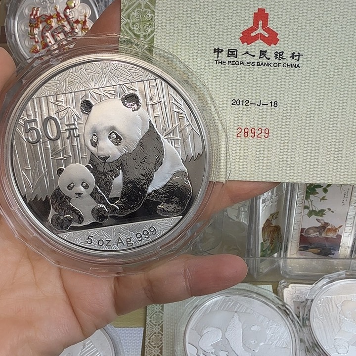 梦***趣纯银2012年5盎司熊猫银币