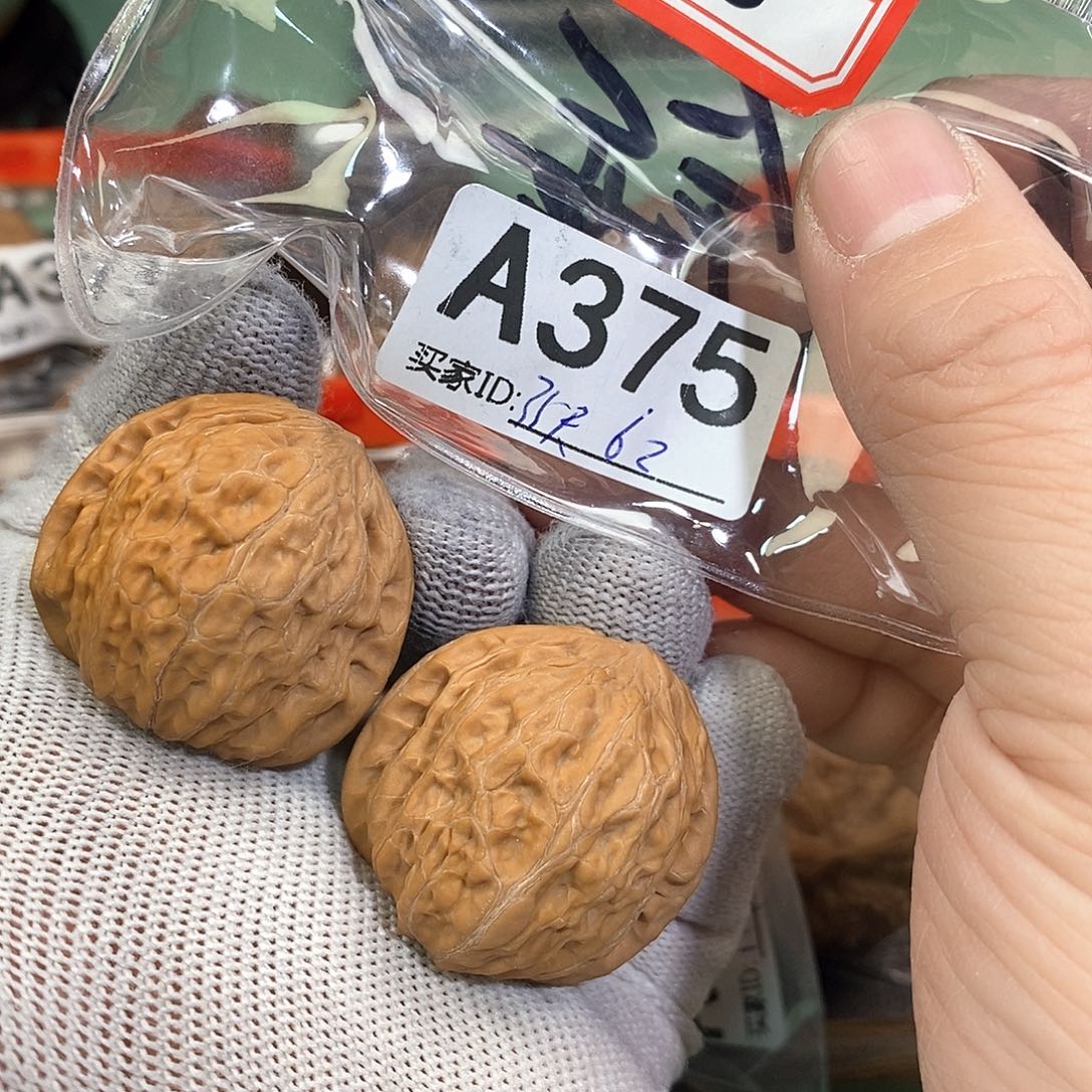 桃核把件铁锤35尺。      