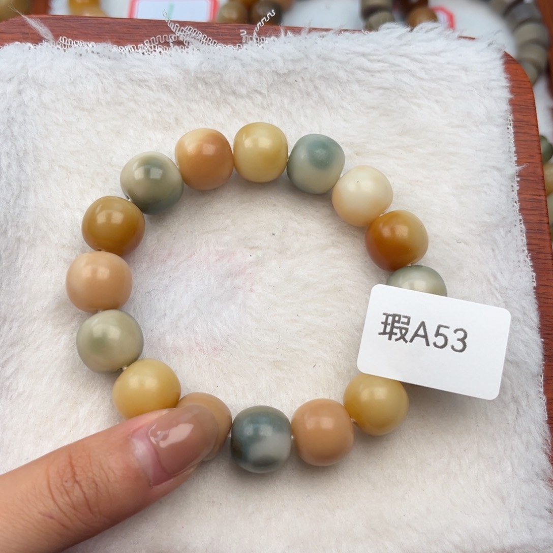 菩提根/象牙果吊坠阿*?瑕A53苹果珠12mm一串