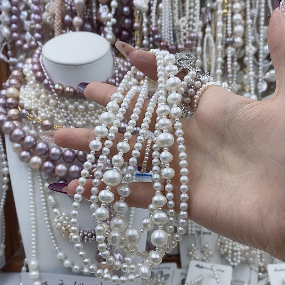 塔***冰淡水珍珠银S925镶嵌耳饰