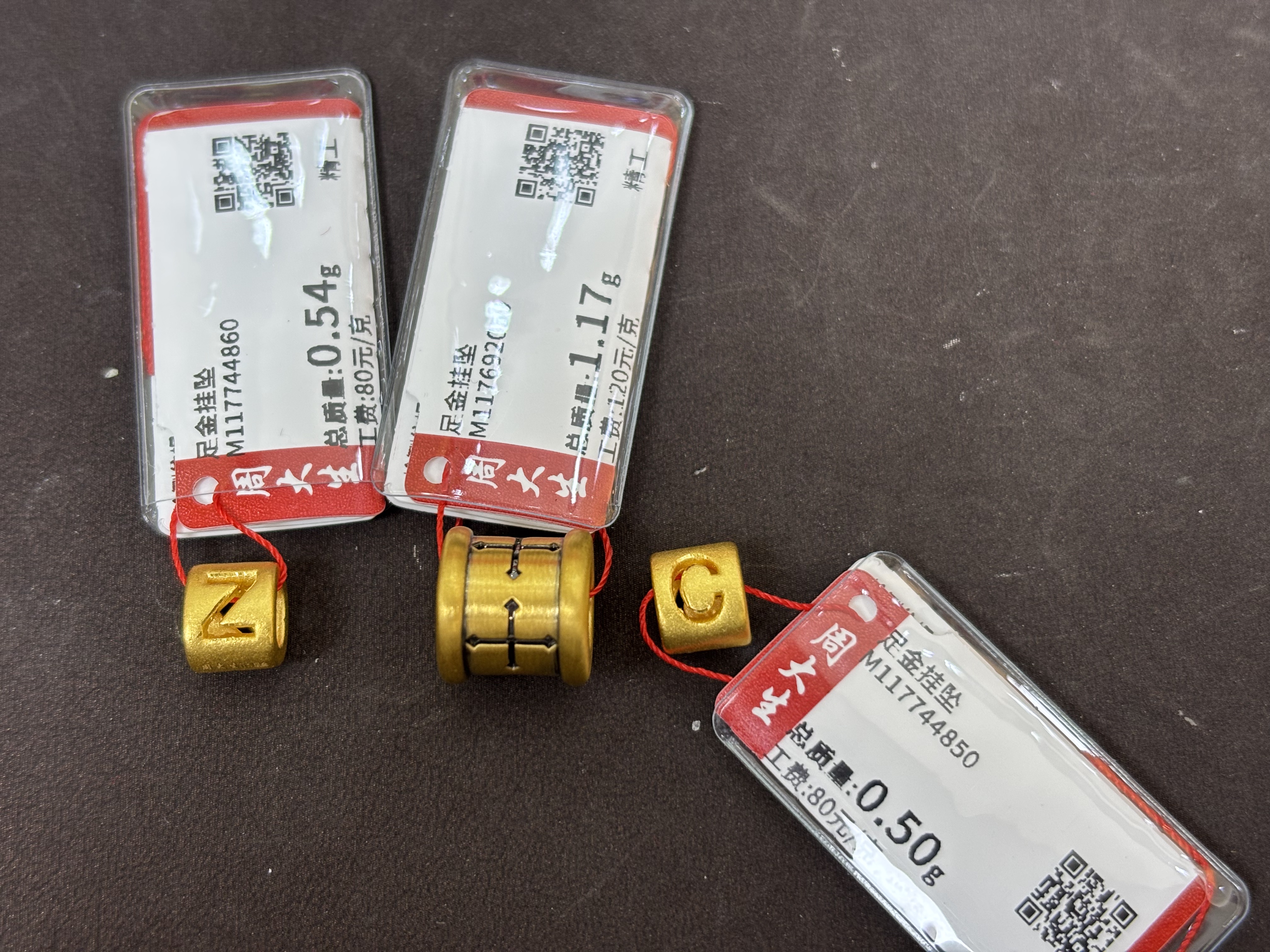 Chow Tai Seng/周大生足金字母信念路路通手链