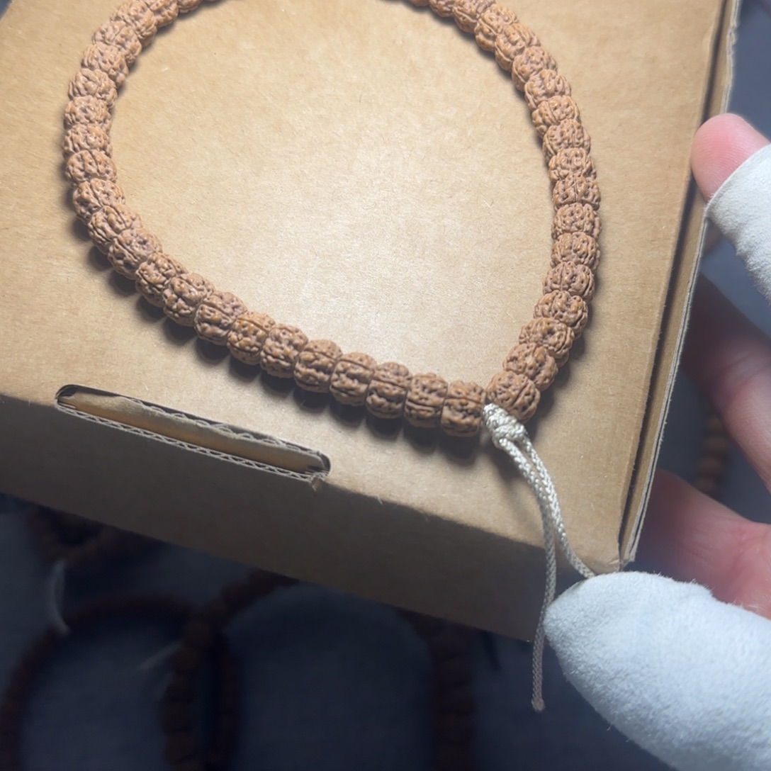 菩提无事牌假一代手持