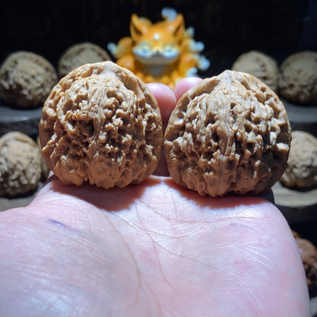 贾***头文玩核桃把件涿鹿南将石