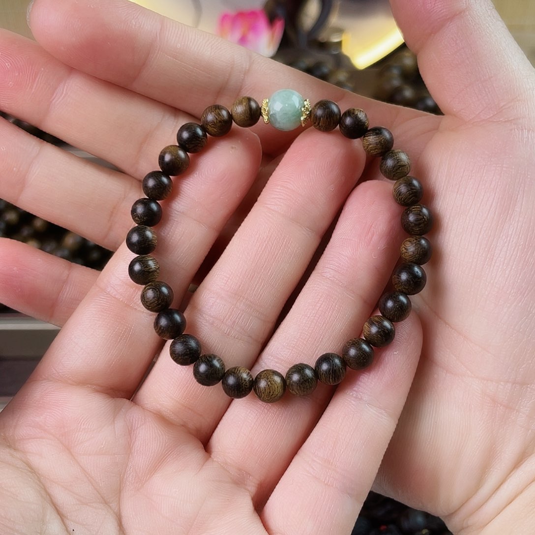 沉香手串天****?越南芽庄老白棋玉化老料瘤疤虎皮0.6