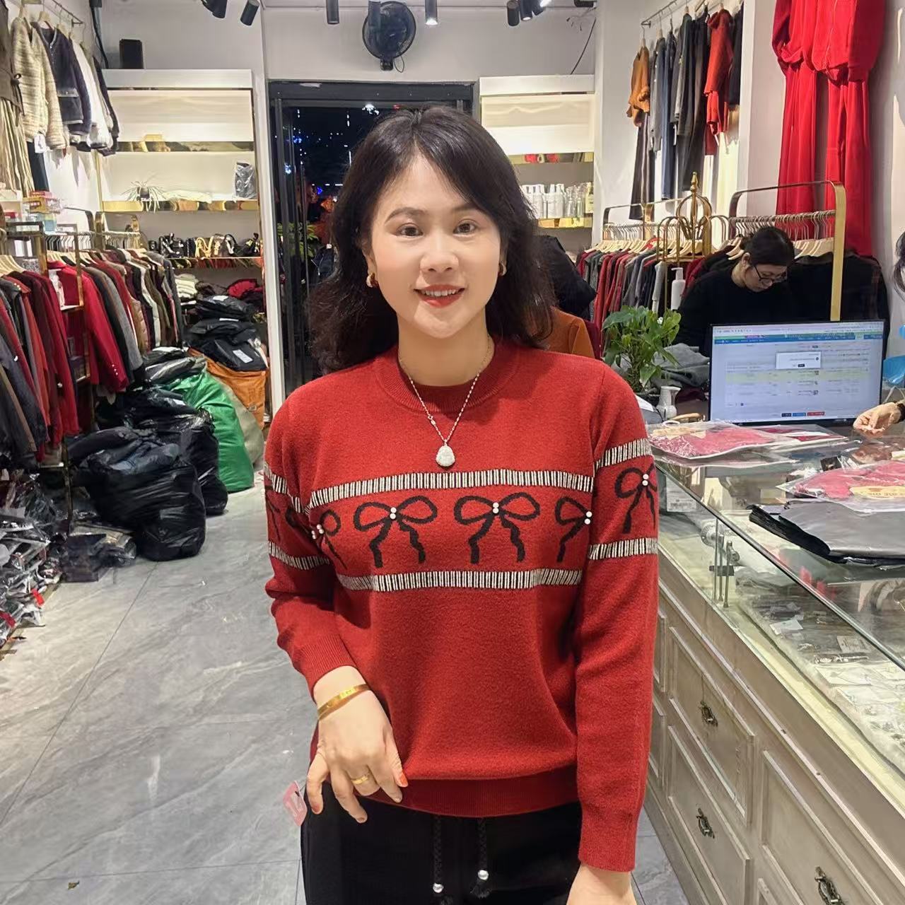 8-5638蝴蝶结毛衣57长