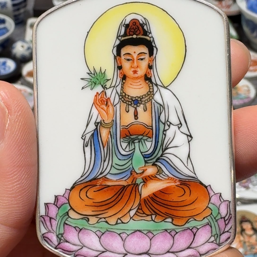 用***茂瓷片精品挂件一个