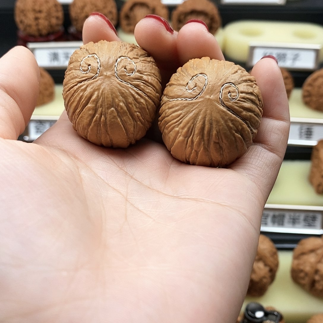 文玩核桃把件猴头元宝
