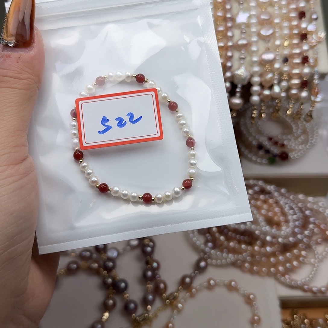 钮***花淡水珍珠手绳银S925镶嵌