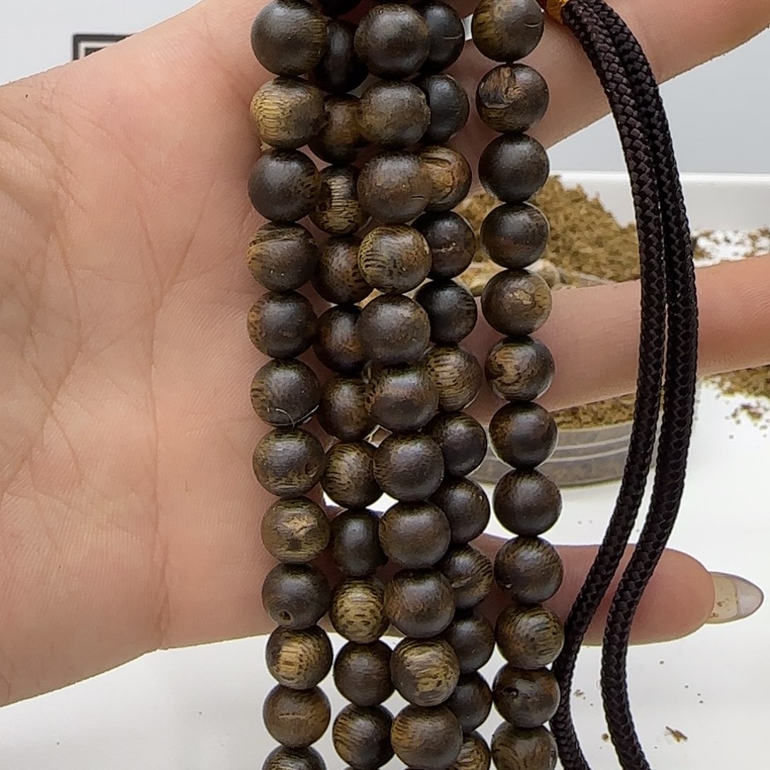 @***蜓沉香碎屑沉香乌身老料精品车挂999沉浮