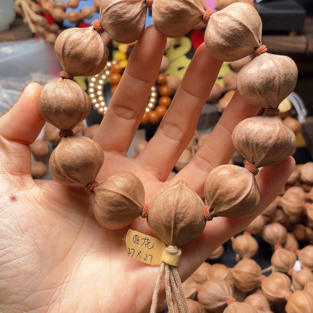 吴***牌橄榄核吊坠2727四花铁核