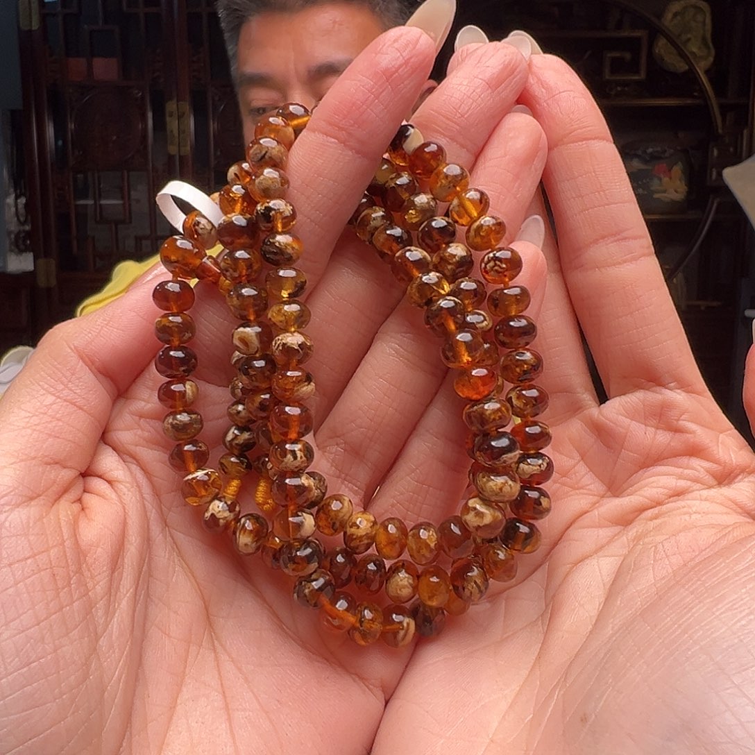 琥珀裸石未镶嵌温**两抚顺琥珀20129。7mm