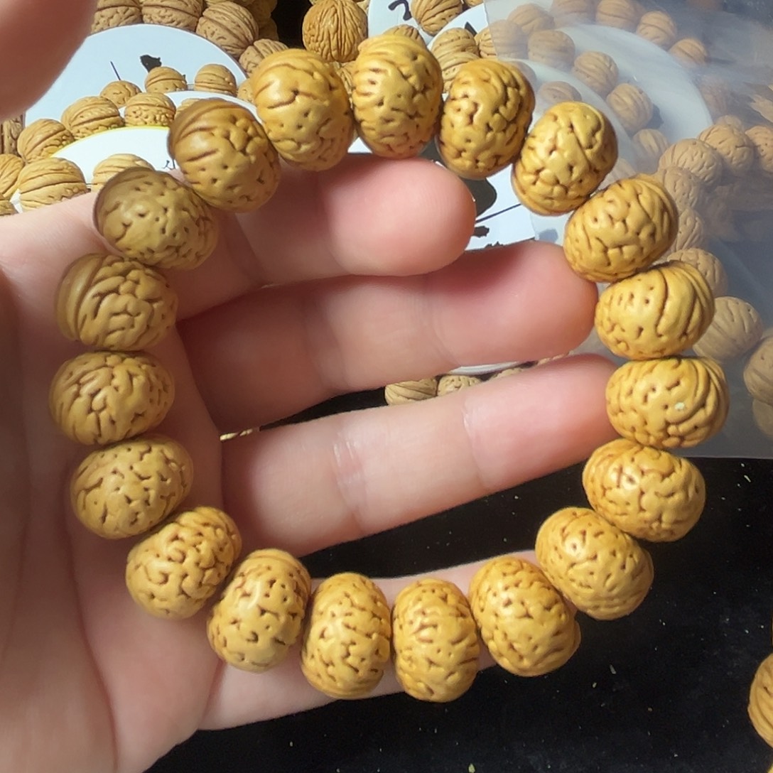 十***七桃核手串18尺寸纽扣