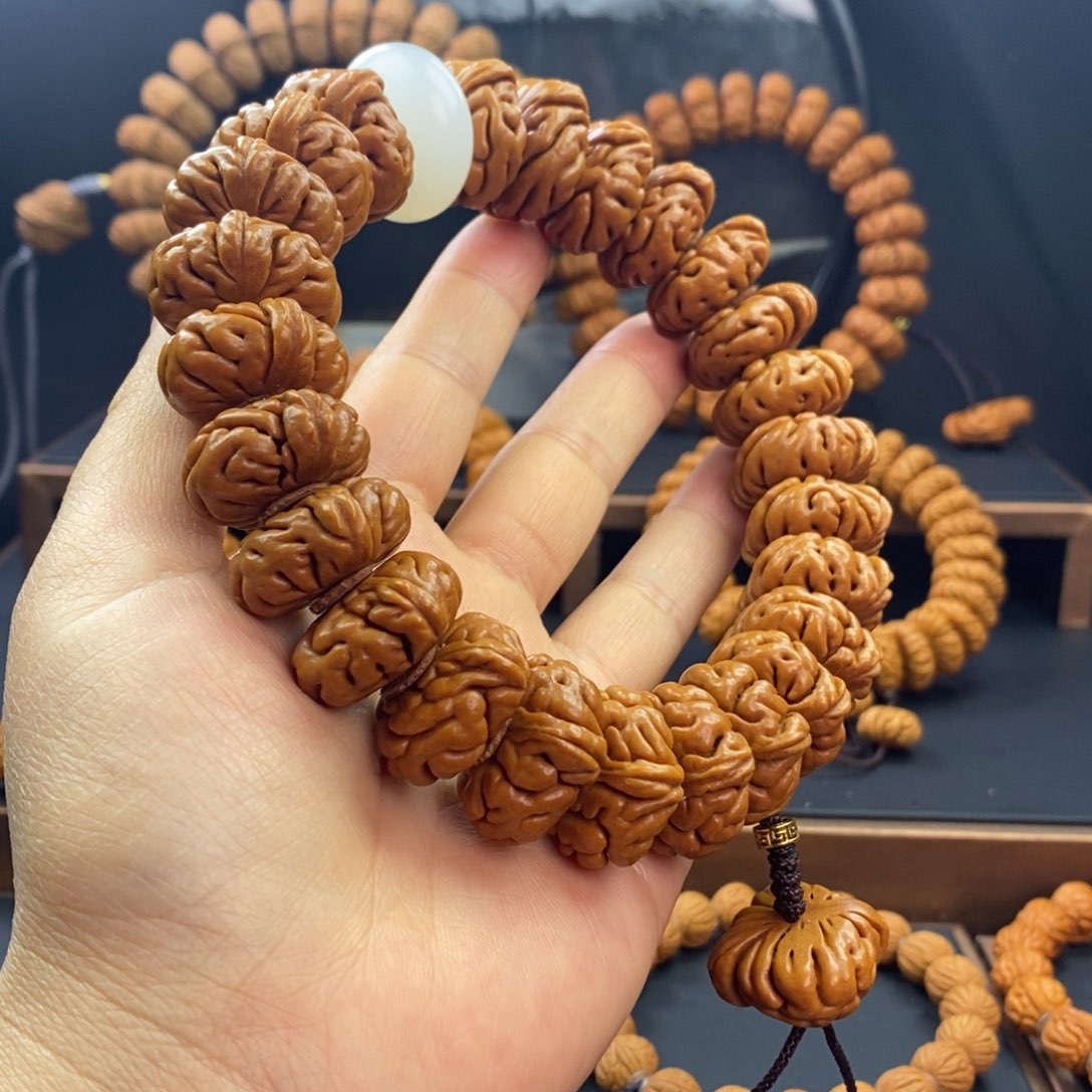桃核手串H龙纹桃核白玉龙