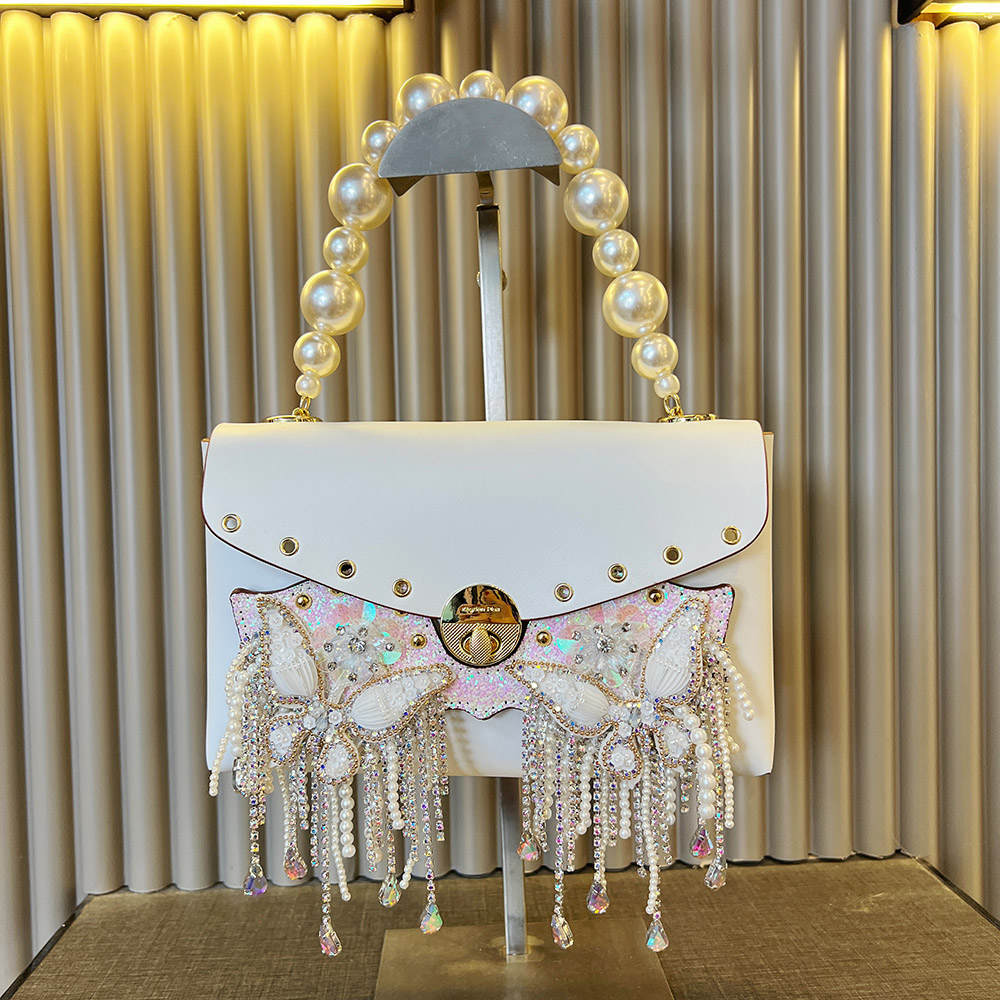 锁扣可折叠单肩猫头鹰耐磨斜挎包流苏白色时尚复古换脸包