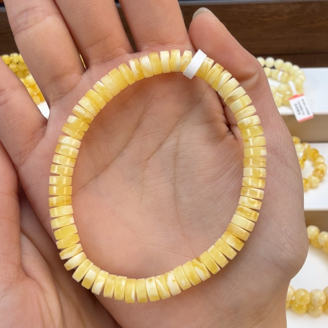 琥珀未镶嵌裸石天然蜜蜡6.6药片手串