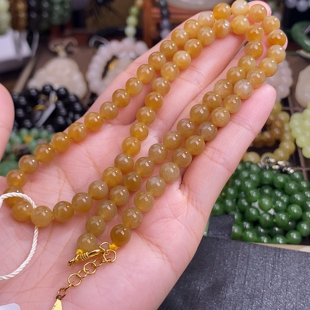 和田玉未镶嵌糖料清货价约7MM珠串