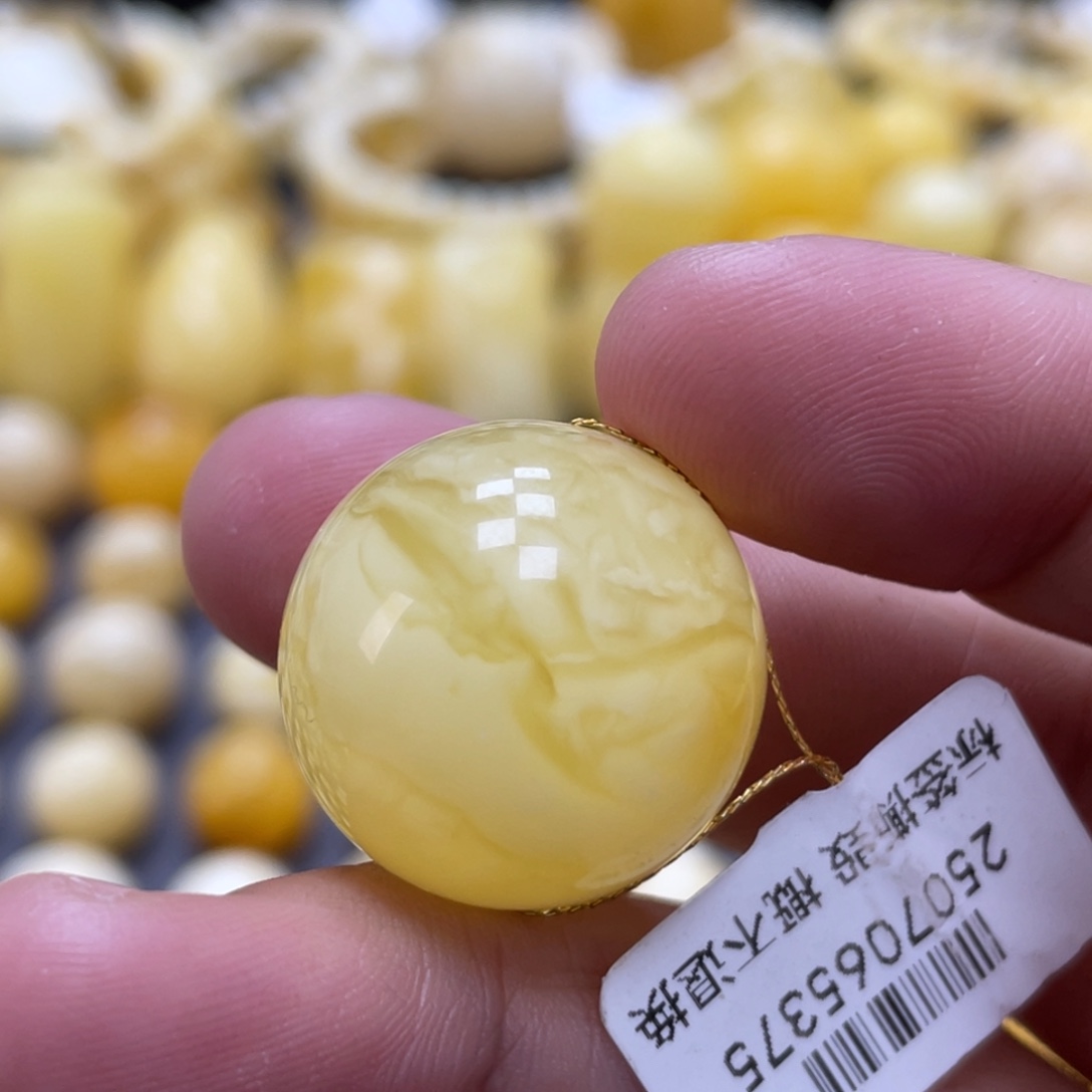 蜜蜡未镶嵌裸石21.4mm瑕疵妖花