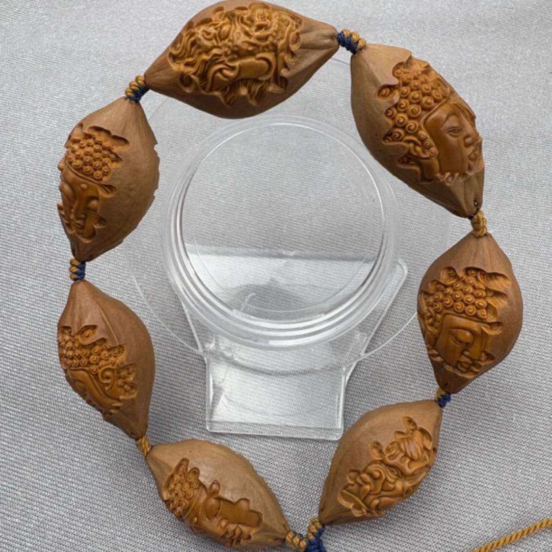 橄榄核雕刻四花包衣佛魔一念文玩手串2.1+