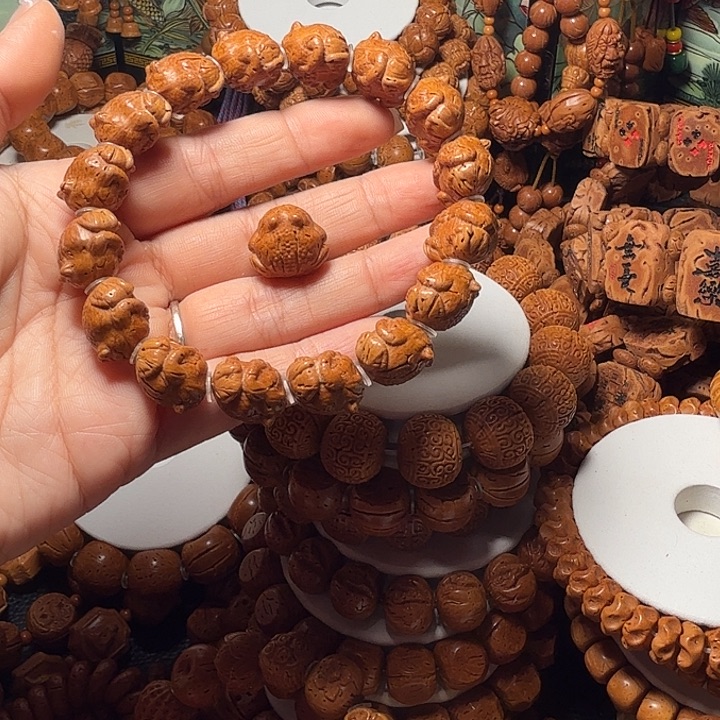 桃核手串呱呱来财