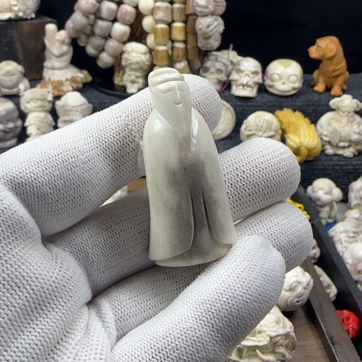 y***轻非金属配饰鹿角雕刻翁仲