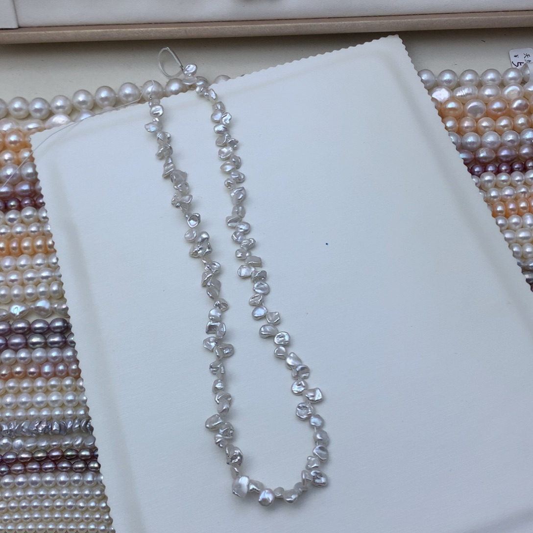 塔***冰淡水珍珠银S925镶嵌颈饰