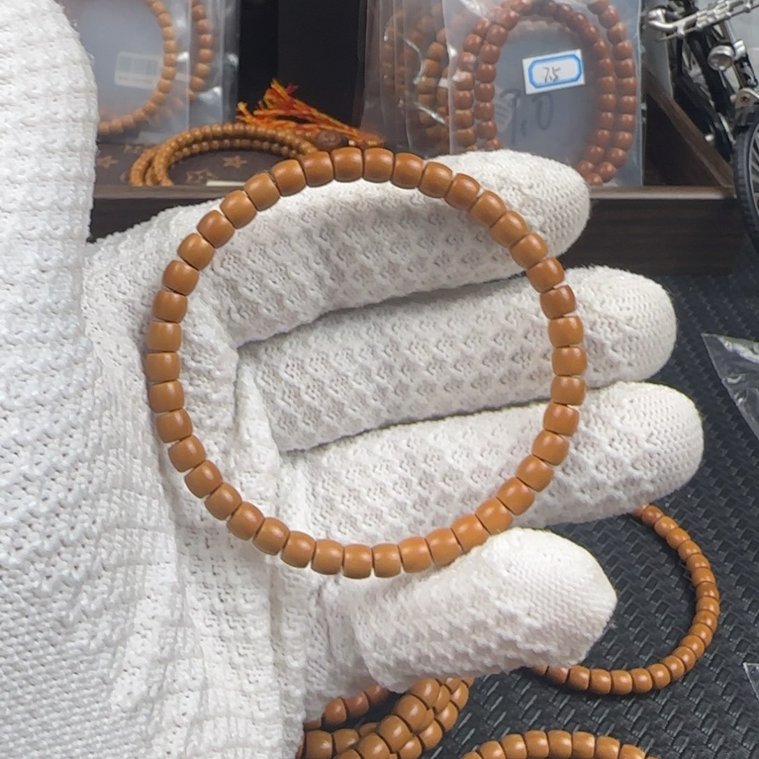 橄榄核吊坠秋*?5.7mm老挝核尖直切单圈