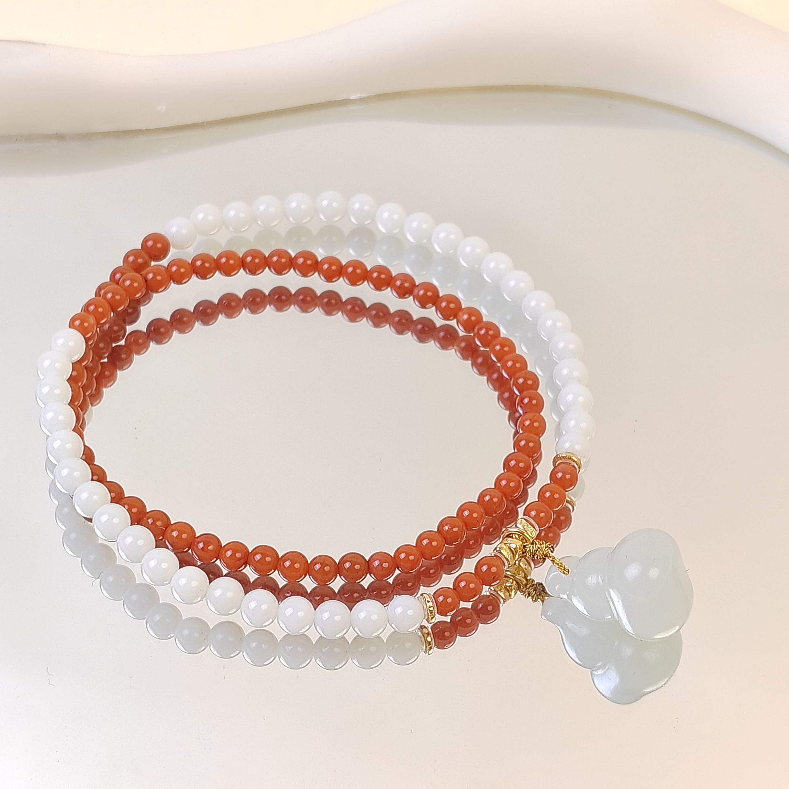 【白杏出墙】俄料葫芦和田玉滴流双圈手串