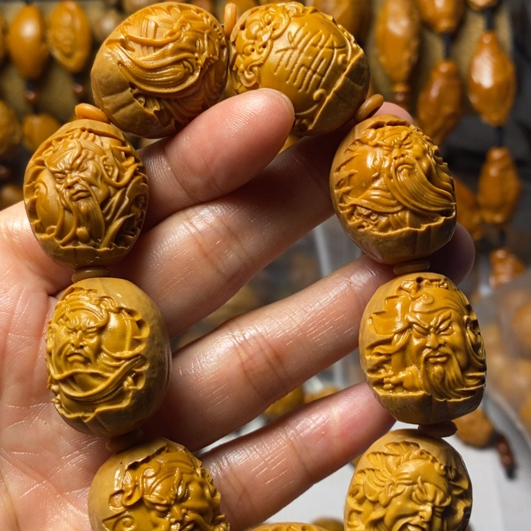 橄榄核手串/手链紫皮包衣关公