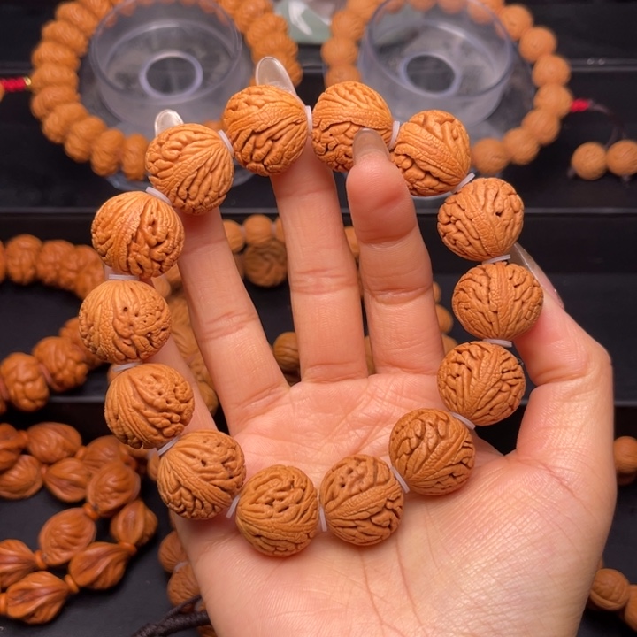 桃核手串黑****使19尺寸绣球（13号链接）