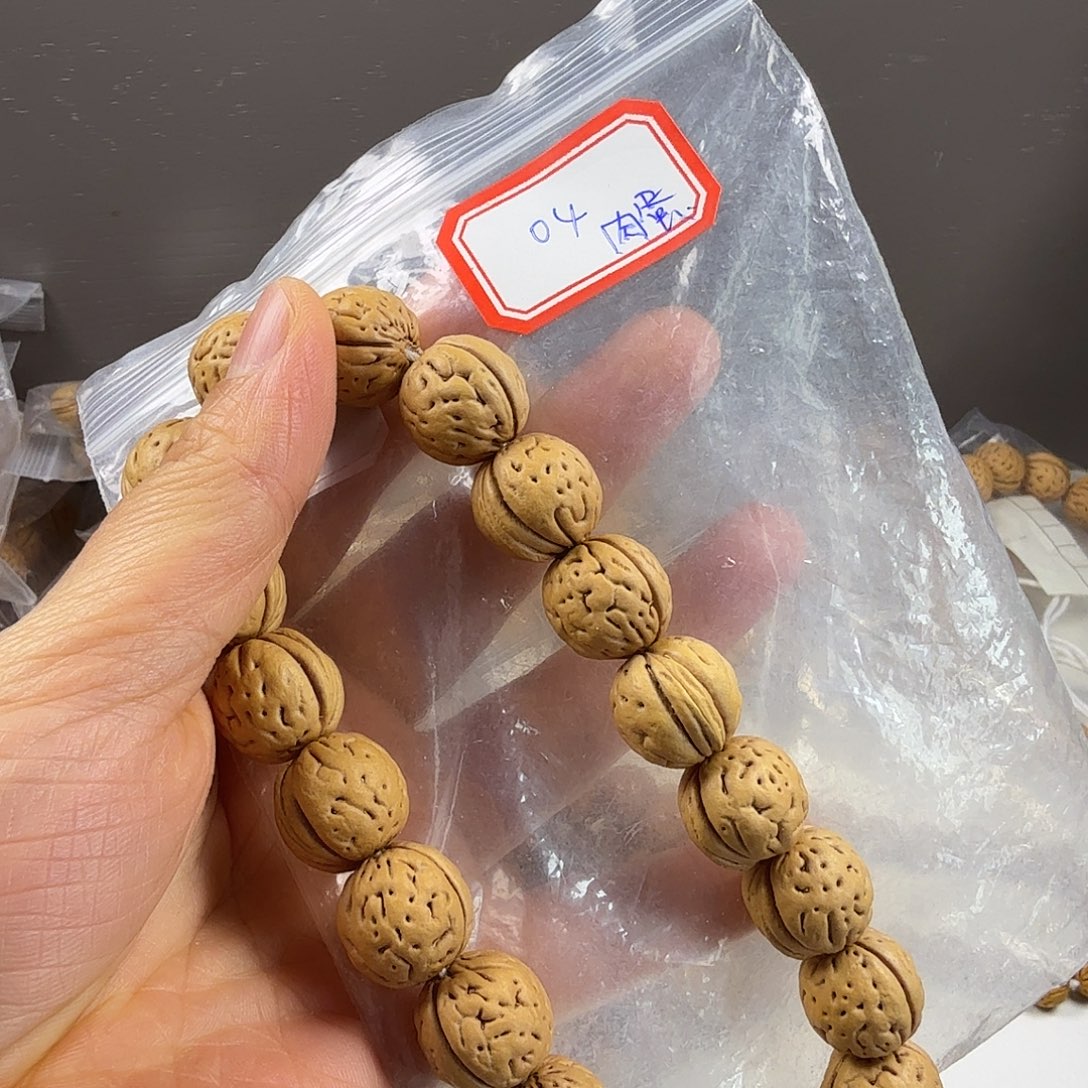 日***鸟桃核手串04号盘锦野生奶油核肉蛋