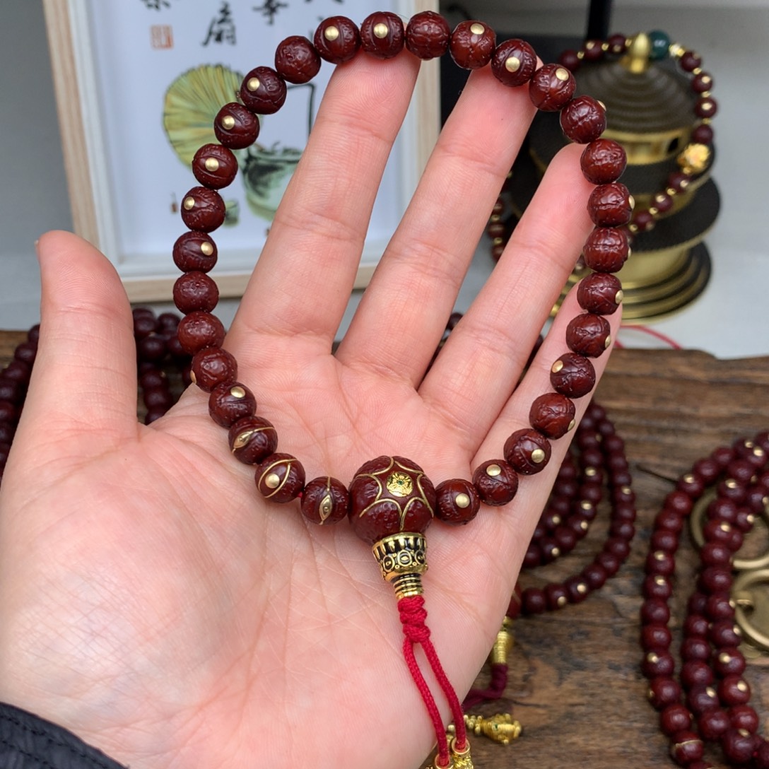 凤眼菩提吊坠8.5 罗眼 手持