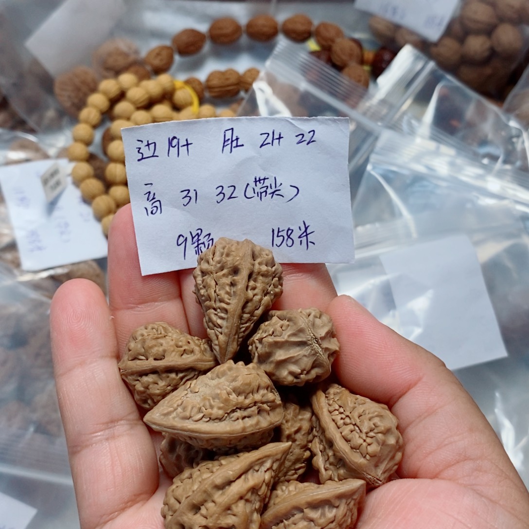 ****.文玩核桃吊坠麒麟角单圈