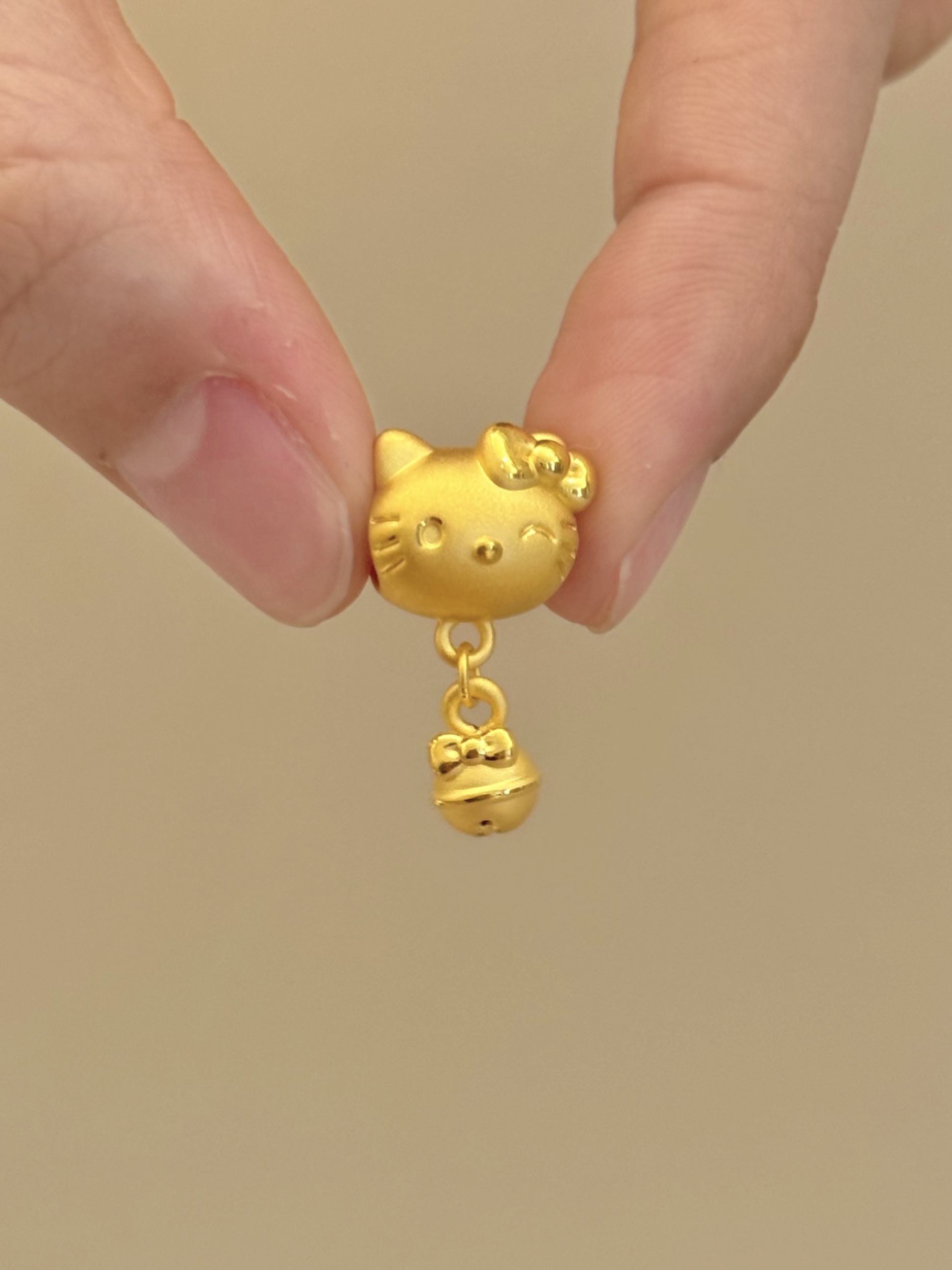 贝贝黄金 足金999 眨眼蝴蝶结铃铛kt 素金 转运珠 102