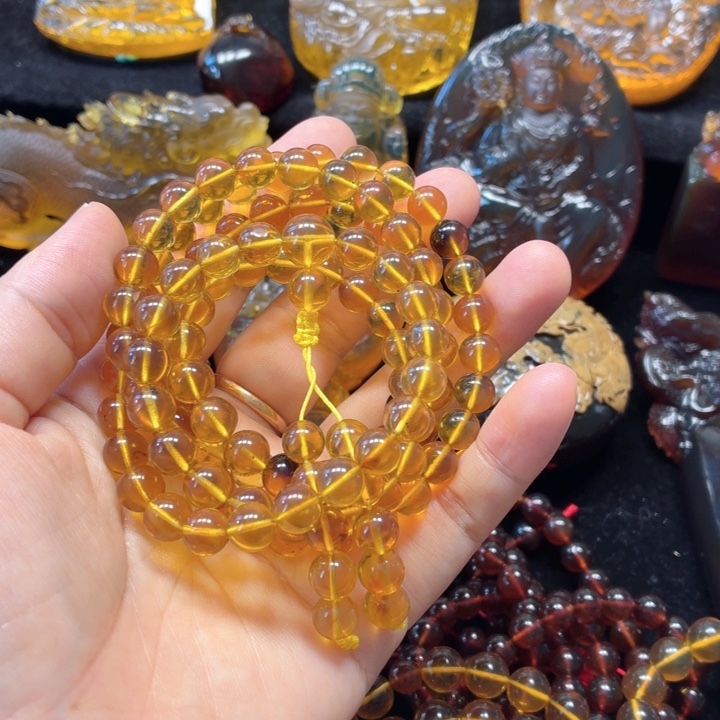 山***.裸石琥珀未镶嵌金棕108颗卡7*