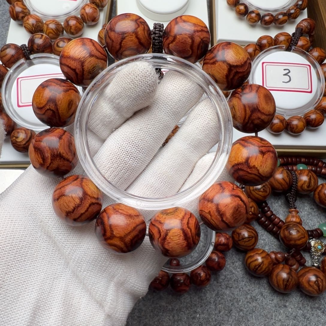 丁***手串/手链黄花梨/降香黄檀2.0黄花梨紫底对眼鬼脸手串