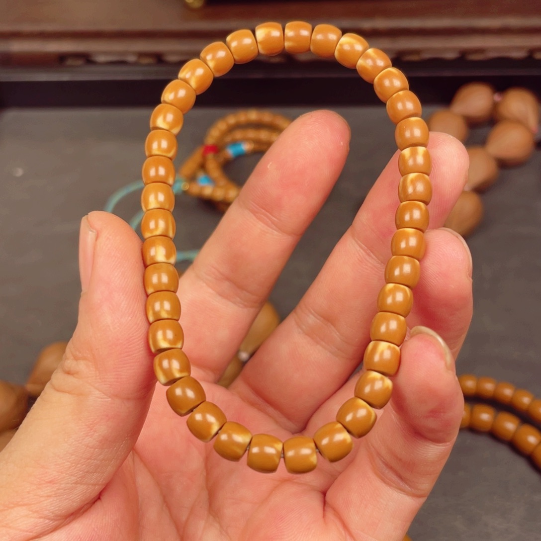 远**明橄榄核尖料手串手链