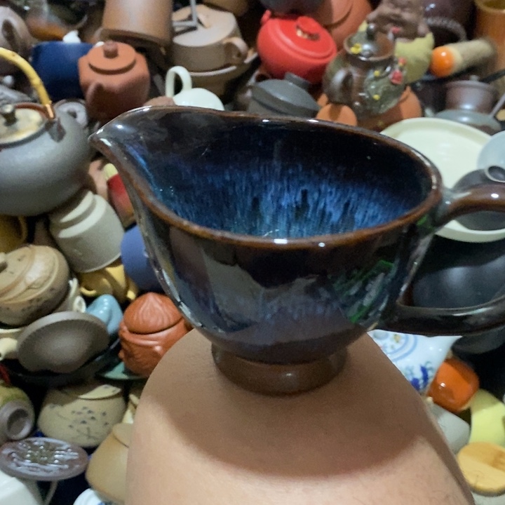 瓷片然后又被别人抢走一个人