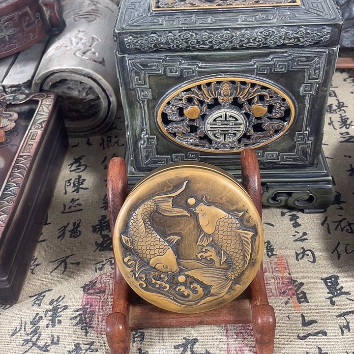 馥***妈双鱼喜珠红丝砚台