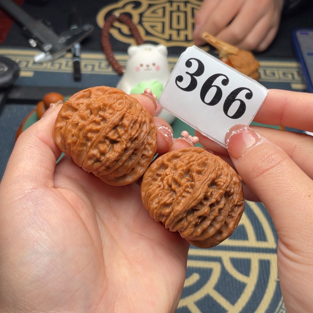 桃核把件45四座楼366号……