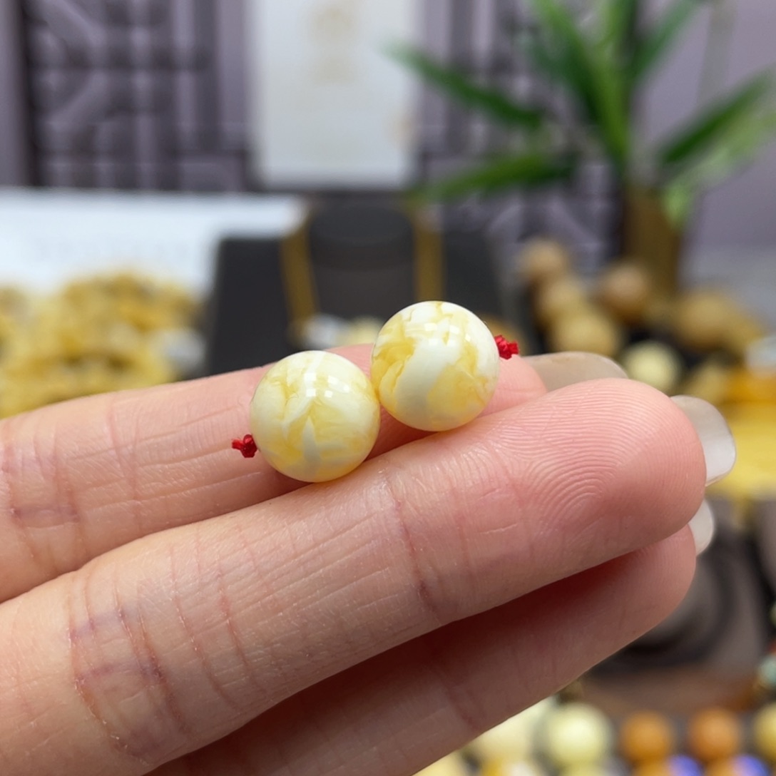 琥珀裸石未镶嵌9.8mm对珠带皮色